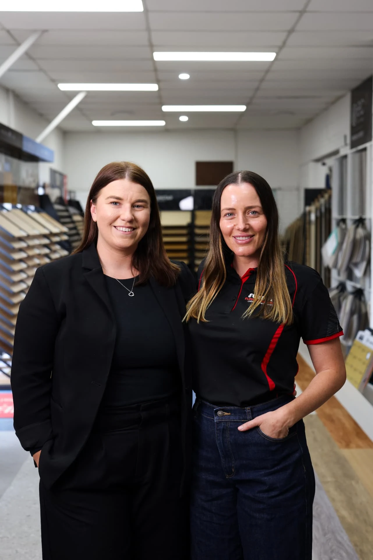 Two of the Sutto's team in the Tweed Heads South showroom