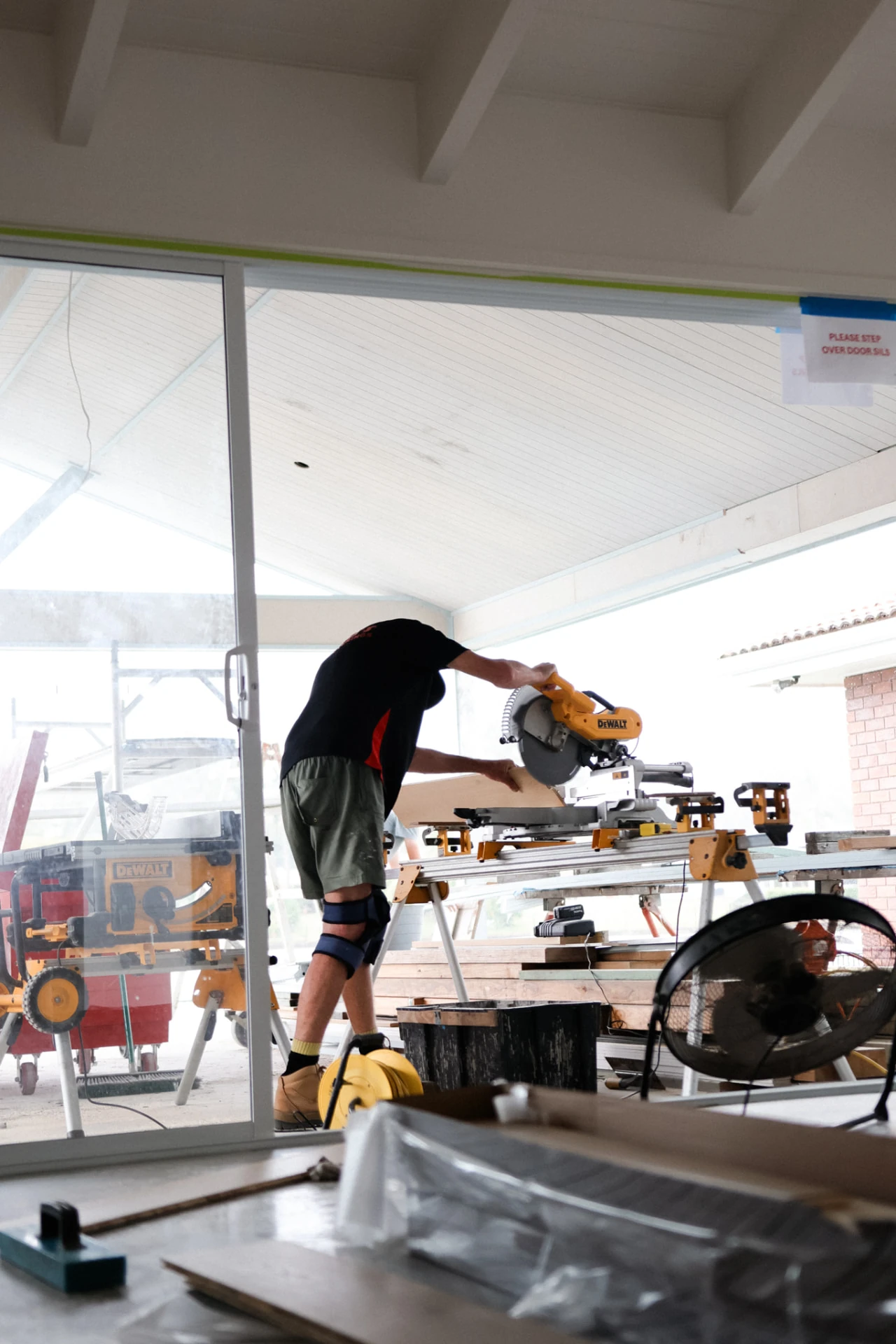Cutting flooring on site with a drop saw