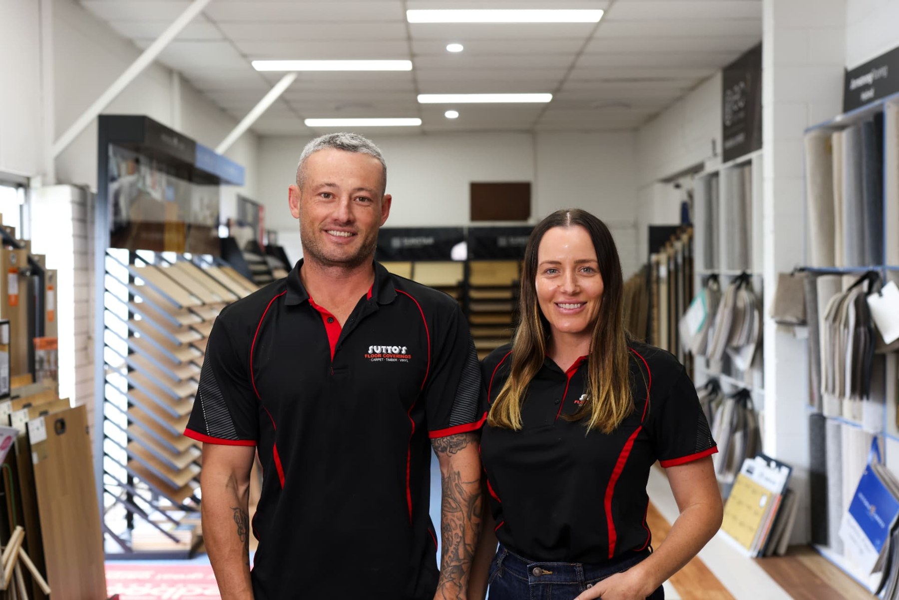 Paris and Dylan Sutton in the Sutto's Floor Coverings showroom